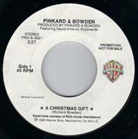 A CHRISTMAS GIFT / NOEL BON TEMPS ROULEE- PROMO PRESSING